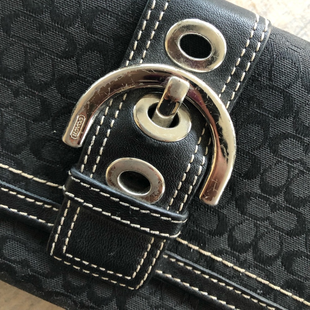Coach Signature C’s Black Trifold Buckle Wallet